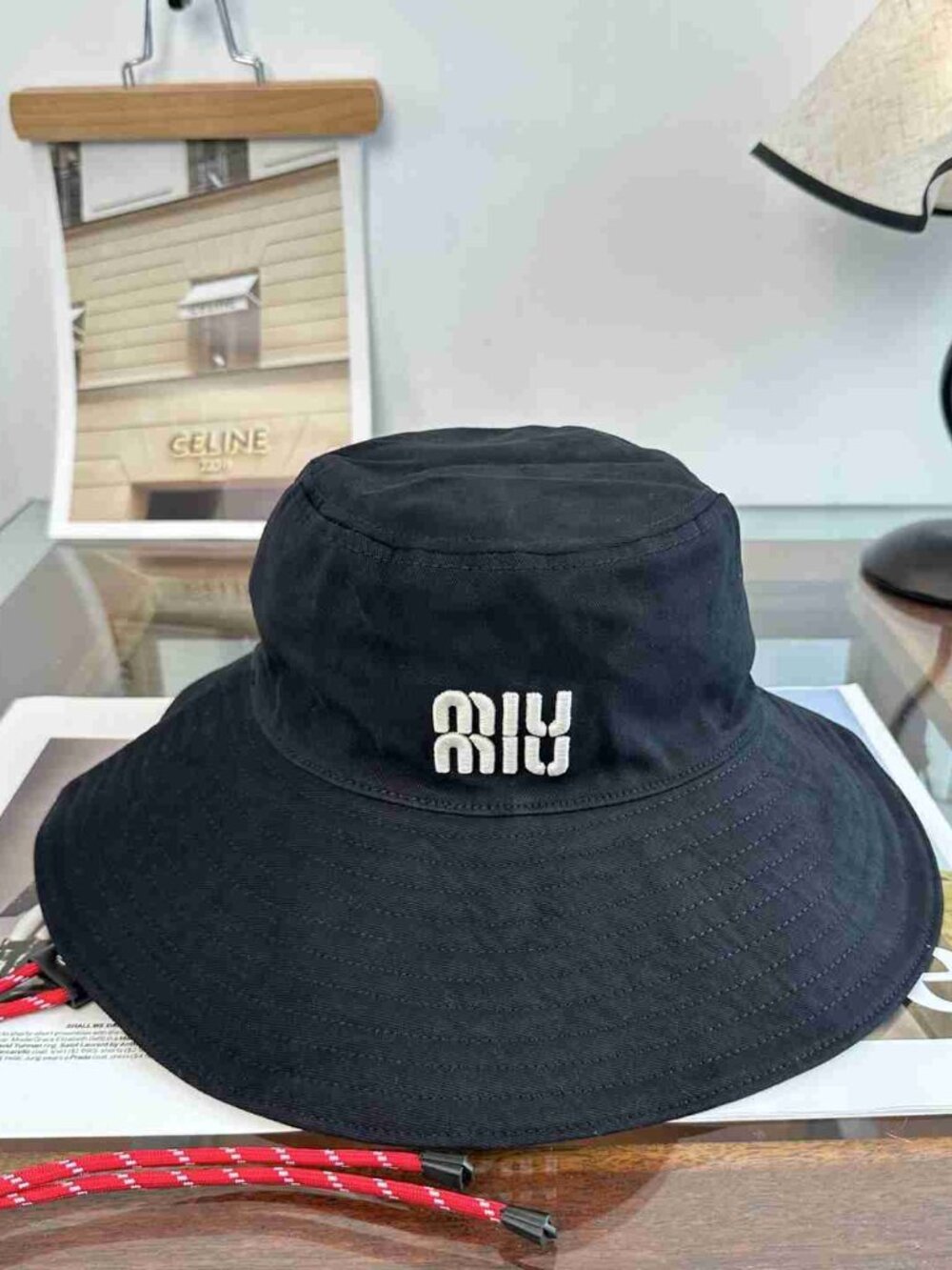 Miu Miu Black Wide Brim Bucket Hat White Logo Red Drawstring